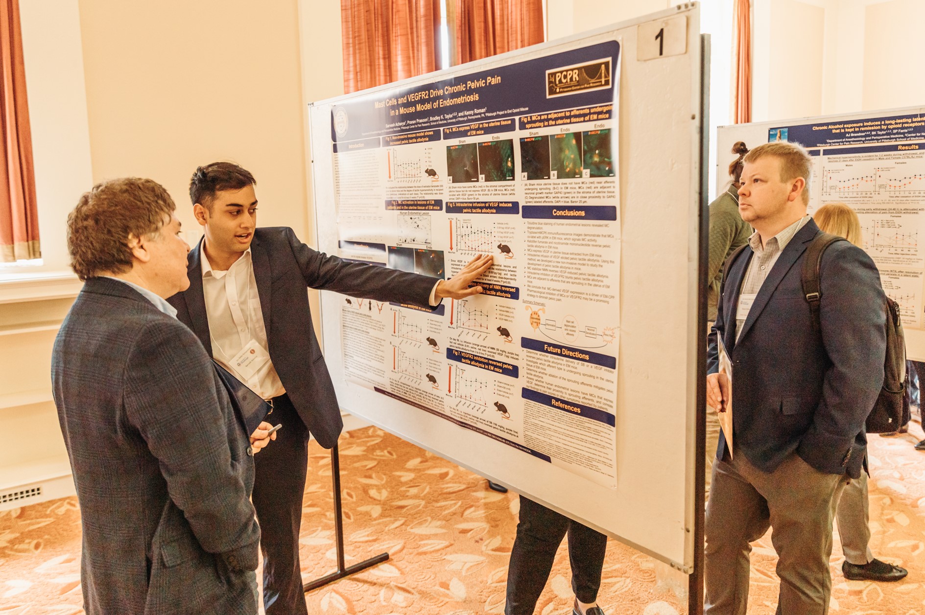Sarvesh Acharya presenting his poster to judge Anthony Kline, PhD